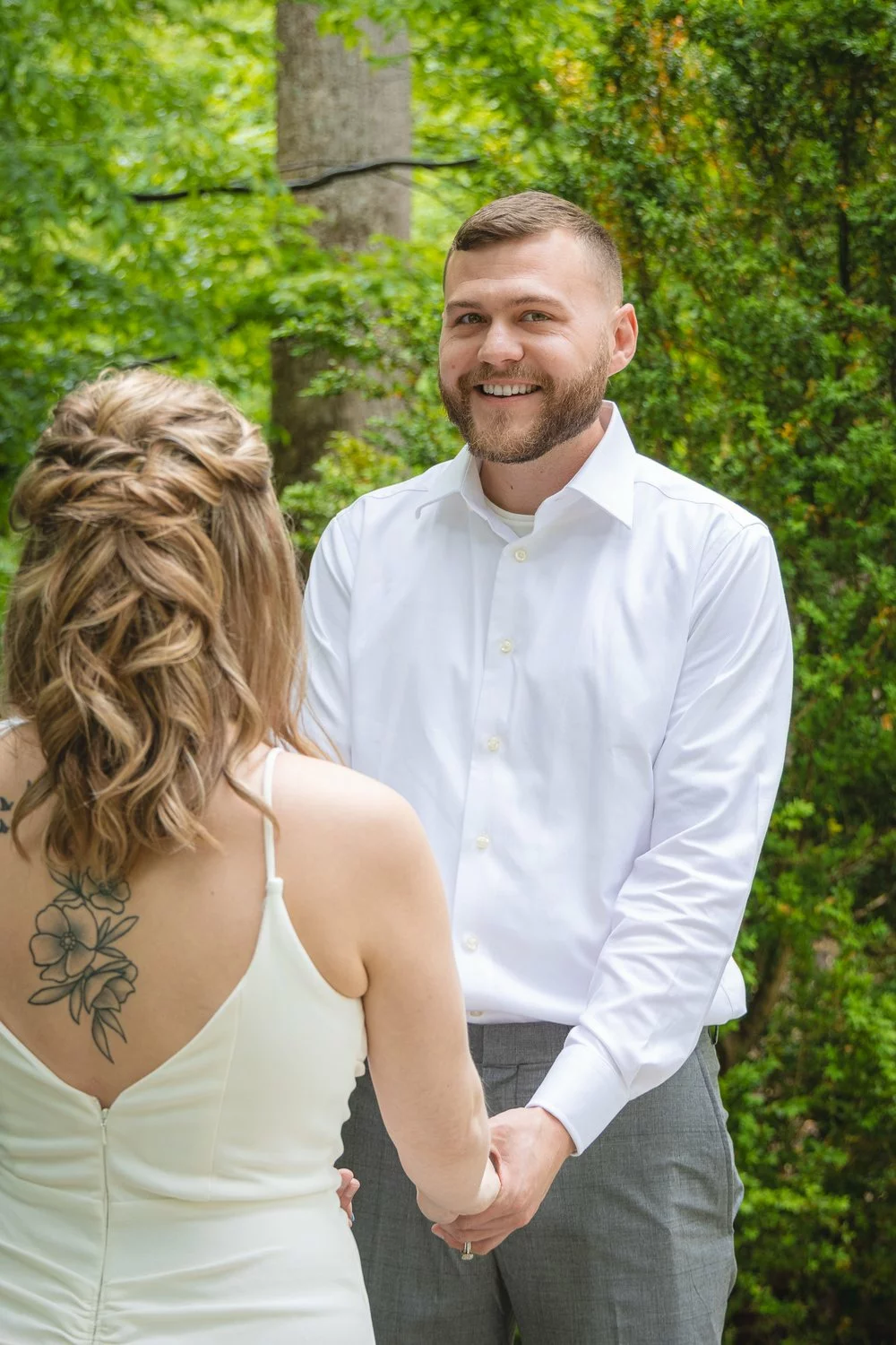 bridge and groom holding hands